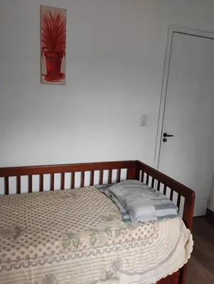 Uma cama ou camas num quarto em Apartment in Itapema Beach