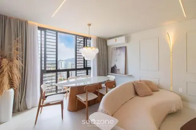 Uma área de estar em Apartamentos Bem Equipados a 100 m da Praia - EVR