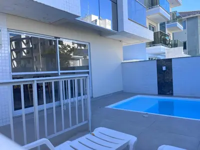 A piscina em ou perto de Lindo apto com piscina e churrasqueira a 400m da praia!