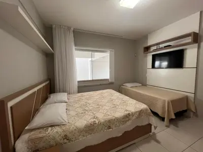 Uma cama ou camas num quarto em Residencial Marcelo Pinheiro
