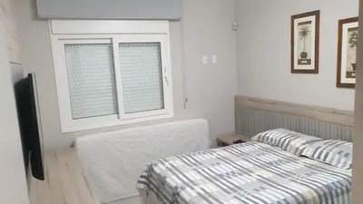 Uma cama ou camas num quarto em Residencial Marcelo Pinheiro