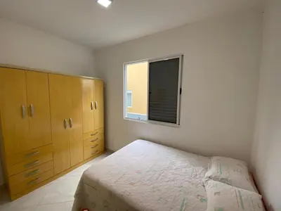 Uma cama ou camas num quarto em Cód 129 - Casa c/ sinuca a 300m da praia