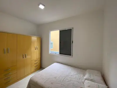 Uma cama ou camas num quarto em Cód 129 - Casa c/ sinuca a 300m da praia
