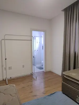 Uma cama ou camas num quarto em Apartamento de luxo em Meia Praia