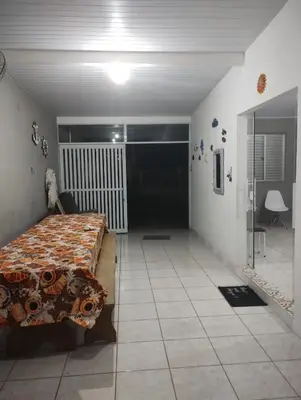 Uma cama ou camas num quarto em casa da vovó