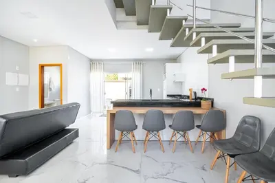 Uma área de estar em Casa 02 | 2 suítes | até 7 pessoas