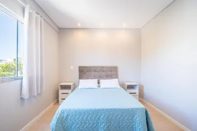 Uma cama ou camas num quarto em Casa 02 | 2 suítes | até 7 pessoas