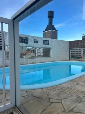 A piscina em ou perto de Aconchegante Apartamento com Piscina