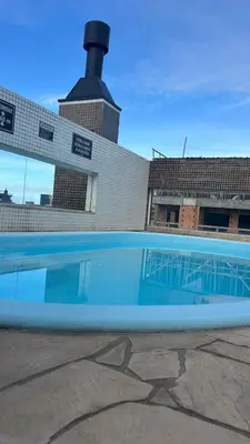 A piscina em ou perto de Aconchegante Apartamento com Piscina