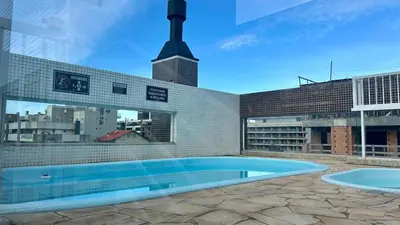 A piscina em ou perto de Aconchegante Apartamento com Piscina