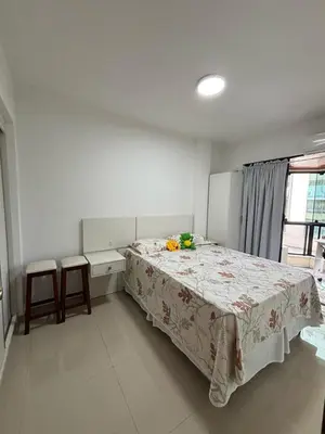 Uma cama ou camas num quarto em Apartamento Verão no centro de Itapema