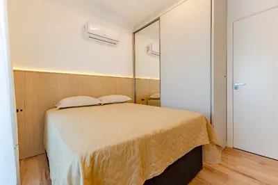 Uma cama ou camas num quarto em Ampla Cobertura Duplex na Praia de Canto Grande