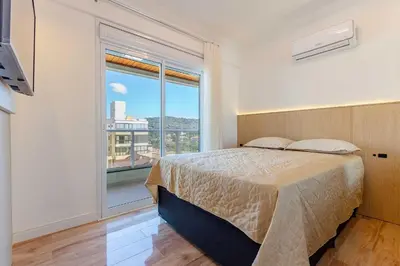 Uma cama ou camas num quarto em Ampla Cobertura Duplex na Praia de Canto Grande