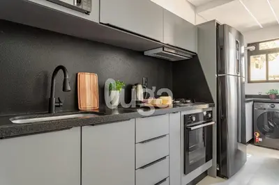 A cozinha ou kitchenette de Conforto & Lazer – Oásis de Itapema