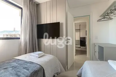 Uma cama ou camas num quarto em Conforto & Lazer – Oásis de Itapema