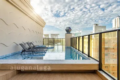 A piscina em ou perto de Conforto & Lazer – Oásis de Itapema