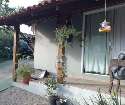 Um jardim no exterior de Casa para descanso