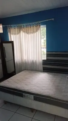 Uma cama ou camas num quarto em Casa para descanso
