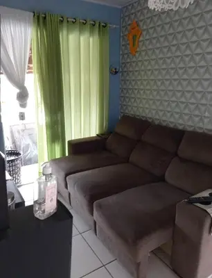 Uma área de estar em Casa para descanso