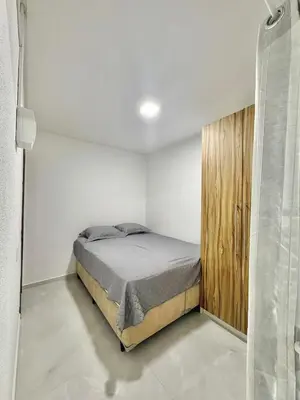 Uma cama ou camas num quarto em Duplex Quadra Mar