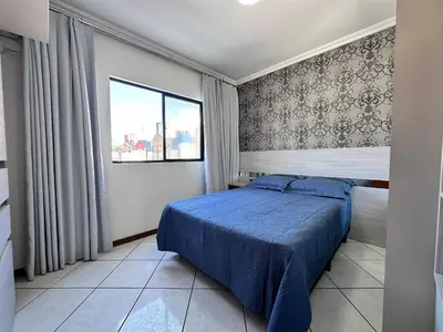 Uma cama ou camas num quarto em B483 - Apartamento de 3 quartos próximo à praia
