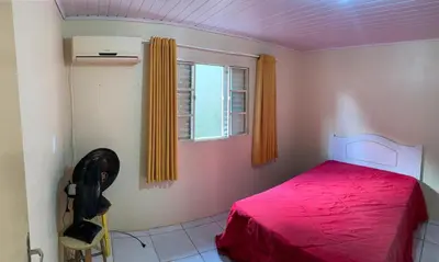 Uma cama ou camas num quarto em Casa com 3 Quartos a 140m da Praia de Calheiros