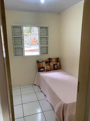 Uma cama ou camas num quarto em Casa com 3 Quartos a 140m da Praia de Calheiros