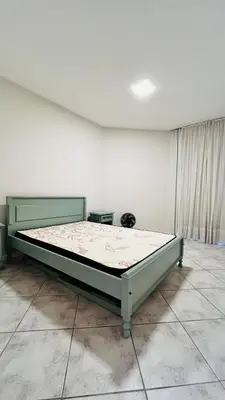 Uma cama ou camas num quarto em Refúgio em Meia Praia