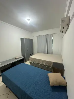 Uma cama ou camas num quarto em Sol de bombinhas