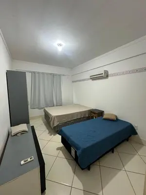 Uma cama ou camas num quarto em Sol de bombinhas