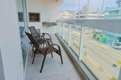 Uma varanda ou terraço em Condomínio Frente Mar com Piscina