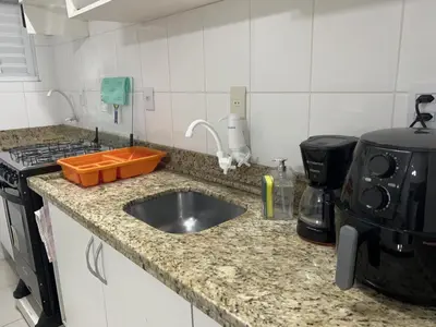 A cozinha ou kitchenette de Clube do Mar- Itapema Meia Praia APTO 102 A