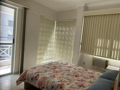 Uma cama ou camas num quarto em Clube do Mar- Itapema Meia Praia APTO 102 A