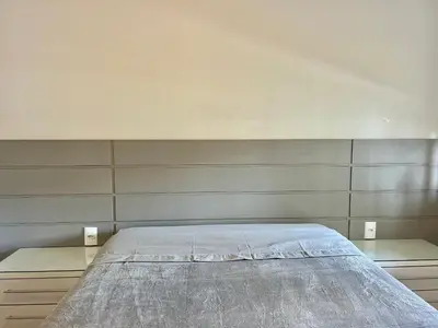 Uma cama ou camas num quarto em Piscina vista mar! Apto na praia de Palmas - AE02J