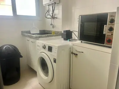 A cozinha ou kitchenette de Piscina vista mar! Apto na praia de Palmas - AE02J