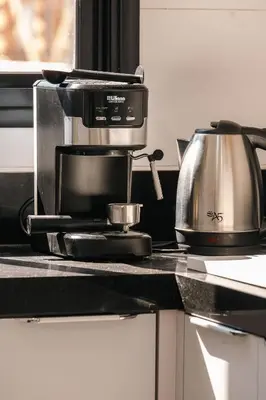 A cozinha ou kitchenette de Unique Residence