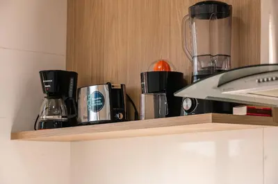 A cozinha ou kitchenette de Unique Residence