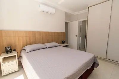 Uma cama ou camas num quarto em Unique Residence