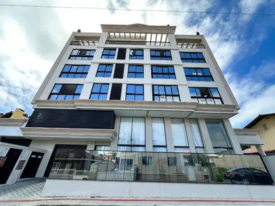 A planta de Apartamento 2 dormitórios com piscina Bombas / SC