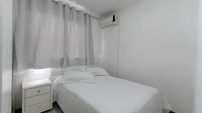 Uma cama ou camas num quarto em Apartamento 3 dormitórios á 80 metros do mar