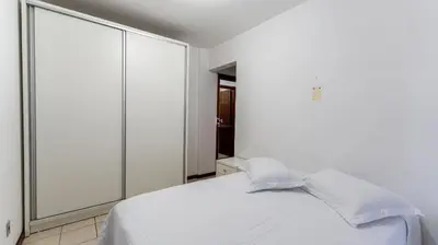 Uma cama ou camas num quarto em Apartamento 3 dormitórios á 80 metros do mar