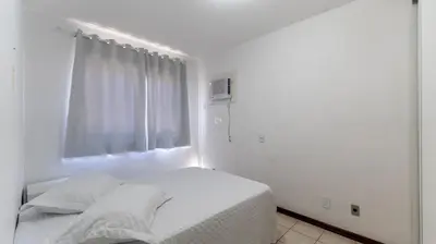 Uma cama ou camas num quarto em Apartamento 3 dormitórios á 80 metros do mar