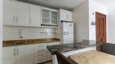 A cozinha ou kitchenette de Apartamento 3 dormitórios á 80 metros do mar