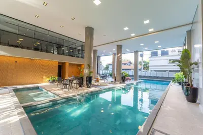 A planta de Apartamento 2 suítes com piscina em Canto Grande / Bombinhas SC