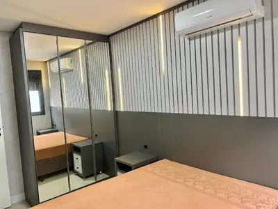 Uma cama ou camas num quarto em Lindo! Apto na praia de Palmas! AA03J