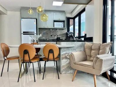 A cozinha ou kitchenette de Lindo! Apto na praia de Palmas! AA03J