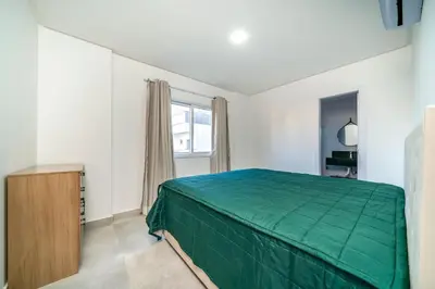 Uma cama ou camas num quarto em Solar do Atlântico 214 – Beira Mar em Bombas