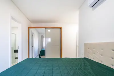 Uma cama ou camas num quarto em Solar do Atlântico 214 – Beira Mar em Bombas