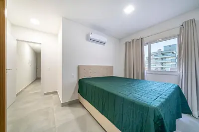 Uma cama ou camas num quarto em Solar do Atlântico 214 – Beira Mar em Bombas