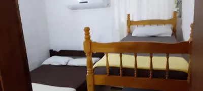Uma cama ou camas num quarto em Residencial panoramica AP1